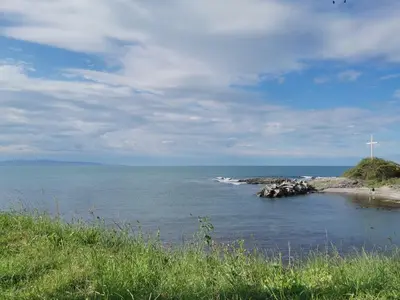 a view of a body of water with a cross at Appart complex - Egrek 4 in Lozenets