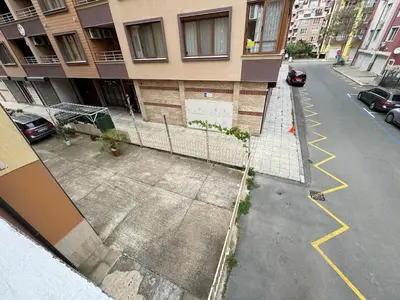 an aerial view of a building with a fence at Sofronii Pomorie Residence in Pomorie
