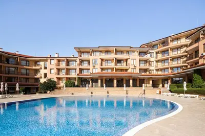a large swimming pool in front of a building at Panorama Dreams - Prestige Apartments in Sveti Vlas