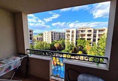 a balcony with a view of a building at Studio for rent Cascadas in Sunny Beach