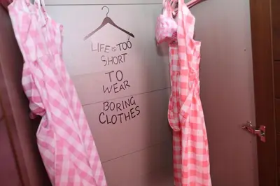 a closet with pink and white checkered clothes at Barbie-Themed 3BDR Penthouse Near The Beach, Nessebar in Nesebar