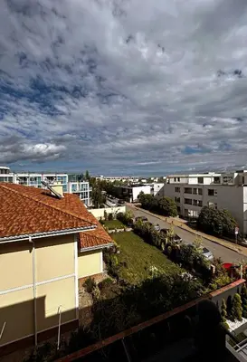 arial view of a city with buildings and a street at The better apartment in Burgas City