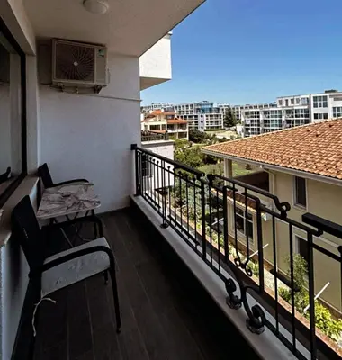 a balcony with a view of a building at The better apartment in Burgas City