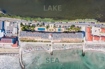 an aerial view of a resort on the beach at Cosher - Gardenia Palace Apt 10 Free Parking in Pomorie