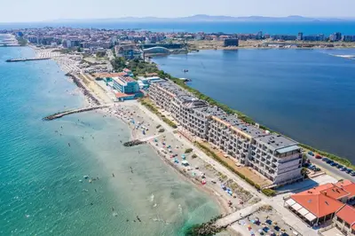 an aerial view of a beach with a resort at Cosher - Gardenia Palace Apt 7 Free Parking in Pomorie