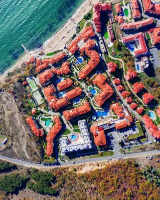an aerial view of a complex by the water at Lavish, Poolside 2 Bed Apt at Garden of Eden in Sveti Vlas