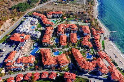 an aerial view of a resort next to the ocean at Lavish, Poolside 2 Bed Apt at Garden of Eden in Sveti Vlas