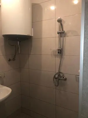 a bathroom with a shower and a sink at Nesebar New Town Apartment in Nesebar