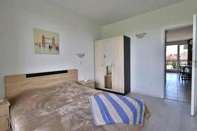 a bedroom with a large bed in a room at Apartament Casa del Sol no 115 in Sunny Beach