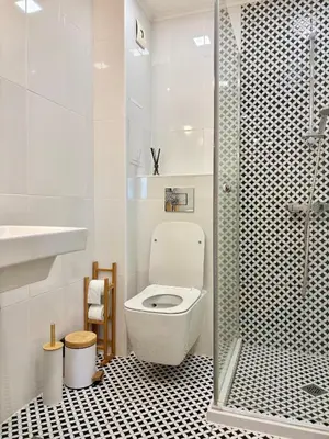 a white bathroom with a toilet and a shower at Cozy Corner in Varna - Free Parking in Varna City