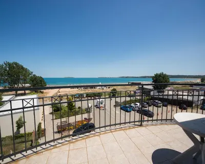 a balcony with a view of a parking lot at 