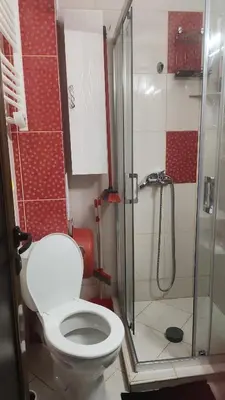 a bathroom with a toilet and a shower at 2 Zimmer Wohnung in Sunny Beach in Sunny Beach