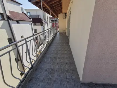 a stairway in a building with a balcony at Emona 5 floor 4 in Burgas City