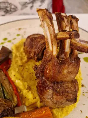 a plate of food with meat and eggs and vegetables at NEU 2025 Emila Romana Boutique- Modernes Luxury Living in Sunny Beach