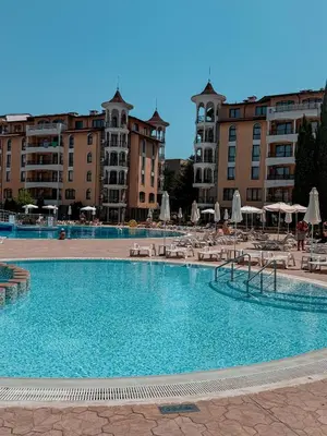 a large swimming pool in front of some buildings at VP Royal Sun in Sunny Beach