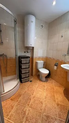 a bathroom with a toilet and a shower and a sink at Sveti Vlas, Paradise Dreams Apartment in Sveti Vlas