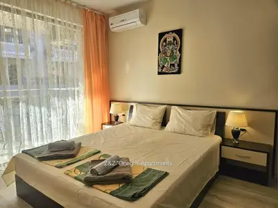 a bedroom with a large bed with a window at Z&Z 