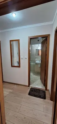 a bathroom with a shower and a mirror in a room at Royal Dreams Apartments, Sunny Beach in Sunny Beach