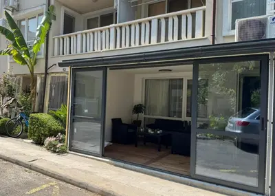 an extension of a house with sliding glass doors at La Terrassa 7 in Burgas City