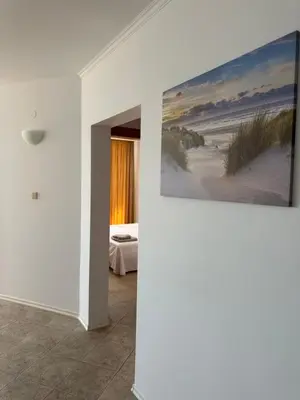 a room with a painting on the wall at Vega View in Sveti Vlas