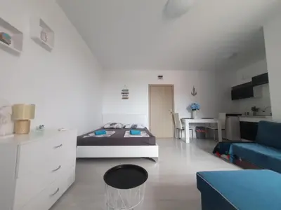 a living room with a bed and a couch at Sunny Day 6 in Sunny Beach