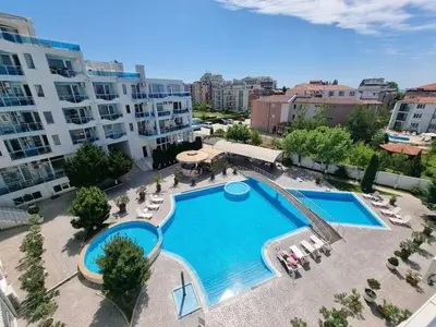 an overhead view of a swimming pool in a apartment at Odisei Large Studio in Nesebar
