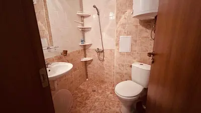 a bathroom with a shower and a toilet and a sink at Sunny Day 6 Studio 11 in Sunny Beach
