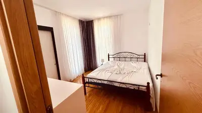 a small bedroom with a bed in a room at SUNNY DAY 6, Apartment 35 in Sunny Beach