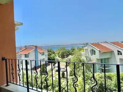 a balcony with a view of the water at Prestige Fort Aparthotel - Private apartment - BSR - 3 in Sveti Vlas