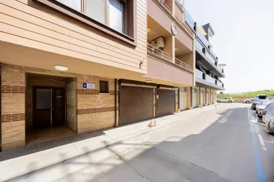 an empty street in front of a building at Marea 2 in Pomorie