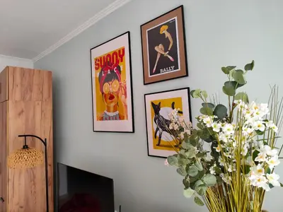 a group of framed pictures on a wall at VODENICATA 5B4 Apartment Sveti Vlas in Sveti Vlas