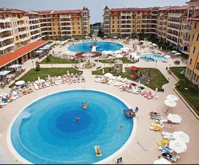 an overhead view of a swimming pool in a resort at 2 Room Apartment Royal Sun Sunnybeach in Sunny Beach