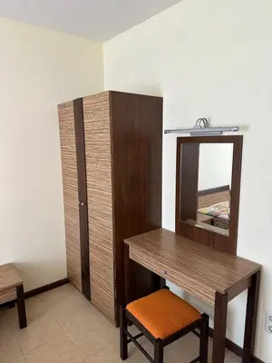 a dressing table and a mirror in a room at 2 Room Apartment Royal Sun Sunnybeach in Sunny Beach