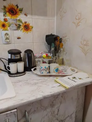 a kitchen counter topped with a counter top with a counter top at Студио Свежест in Pomorie
