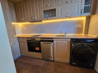 a kitchen with a sink and a dishwasher at Super Lovely Apartment in Burgas City