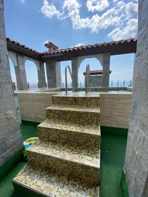 a set of stairs in front of a building at Marina Park OLIWIA in Sveti Vlas