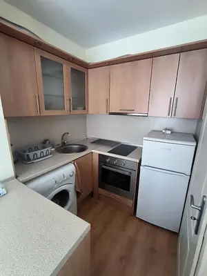 a small kitchen with a sink and a dishwasher at PSB Apartment in Flores park in Sunny Beach