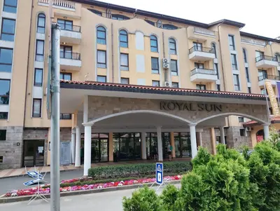 a hotel building with a sign that reads royal sun at 2 Room Apartment with Poolview Royal Sun in Sunny Beach