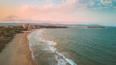 a view of a beach with a city in the background at VIGO Nessebar in Nesebar