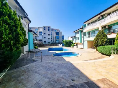 a courtyard with a swimming pool in a building at NeV Getaway for 2 in Burgas City