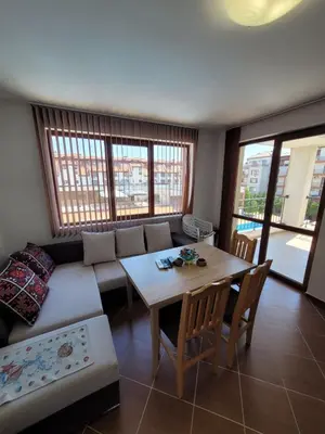 a living room with a couch and a table at Famagusta Antoniya in Aheloy