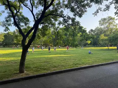 a group of people playing in a park at Lazzuro 7 in Burgas City