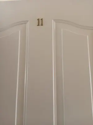 two white cabinets with numbers on top of them at Imperial Fort Club in Sveti Vlas