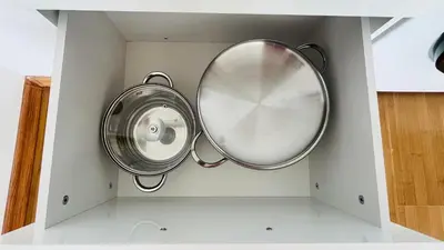 a washer and dryer in a bathroom with a sink at ASTORIA II Apartment 54 One Bedroom in Elenite