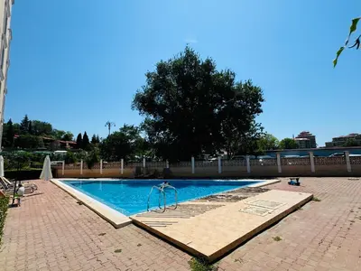 a swimming pool with aicrobialicrobialicrobialicrobialicrobial at ASTORIA II Apartment 24 One Bedroom in Elenite