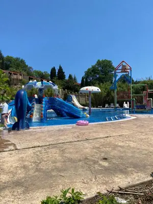 a large water park with a water slide at ASTORIA II Apartment 24 One Bedroom in Elenite
