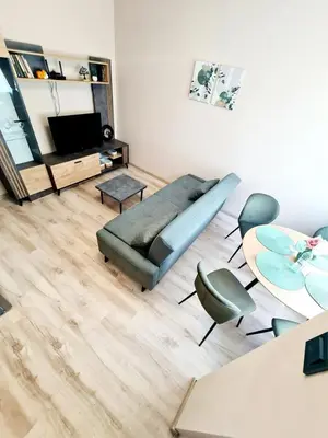 a living room with a couch and chairs at Fresh & Cozy Flat Near Varna Cathedral in Varna City