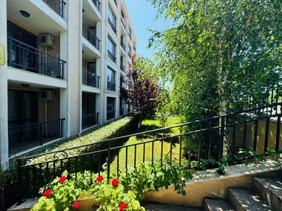a balcony of a apartment building with flowers on it at ASTORIA II Apartment 23 One Bedroom in Elenite