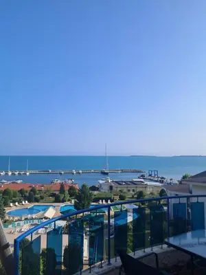 a view of the ocean from the balcony of a resort at Yacht Port apartment #sea view# in Sveti Vlas