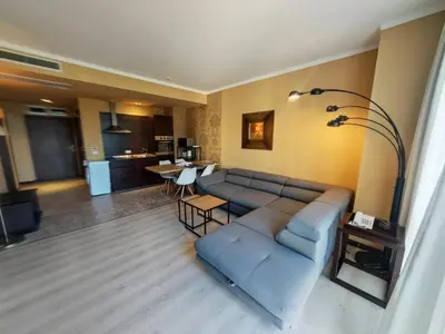 a living room with a couch and a table at Royal Barcelo G404 Sunny Beach in Sunny Beach